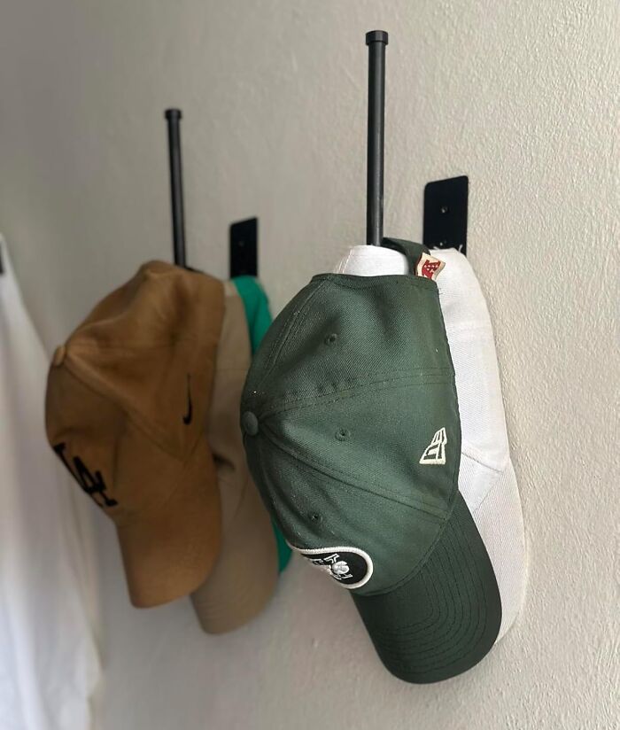 That Wobbly Tower Of Hats? Meet Your Match With This Wall-Mounted Baseball Cap Rack