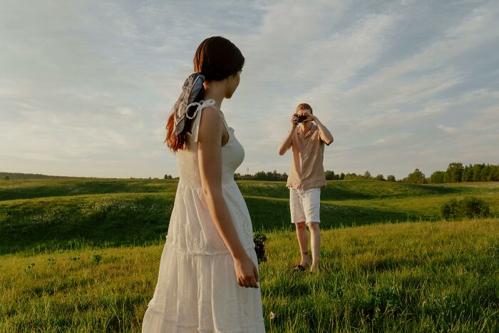 Taking Multiple Photos Until She Gets The Perfect One