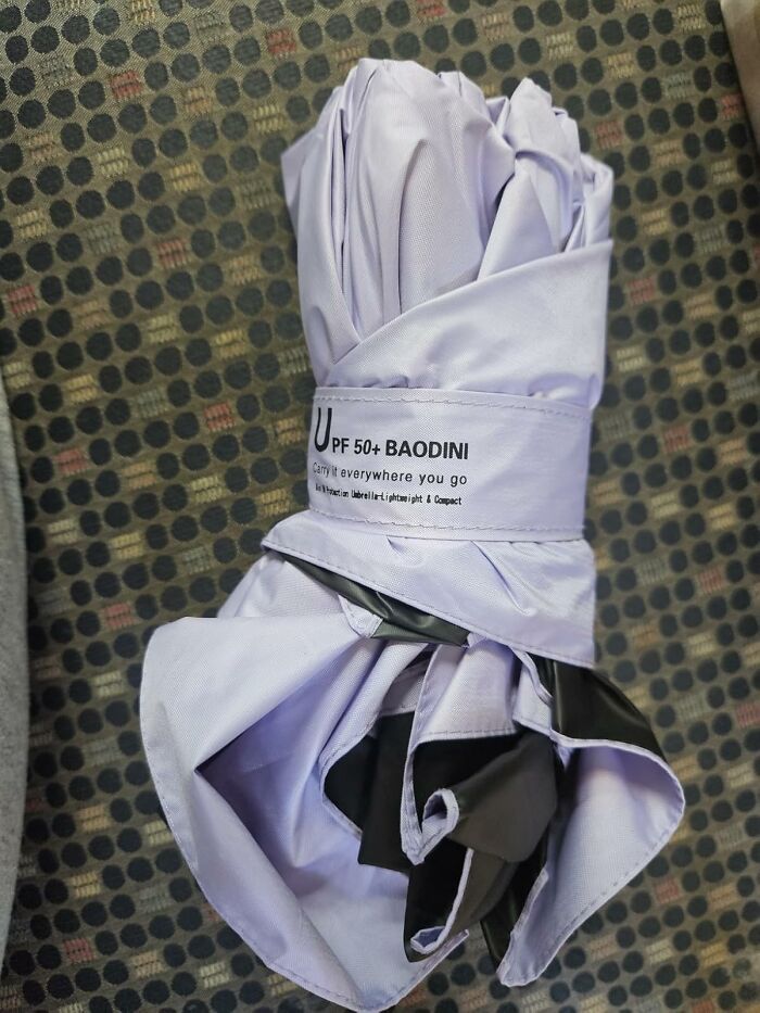 Rain, Rain, Go Away - This Mini Umbrella Has You Covered (Literally)