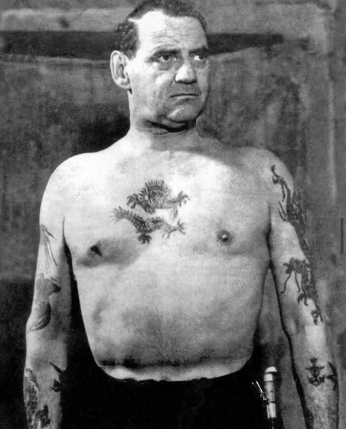 King Frederick IX Shows His Tattoos and Guns, 1951