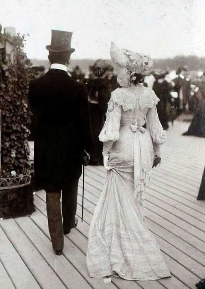 Elegant Couple at the French Races: Ready to Impress