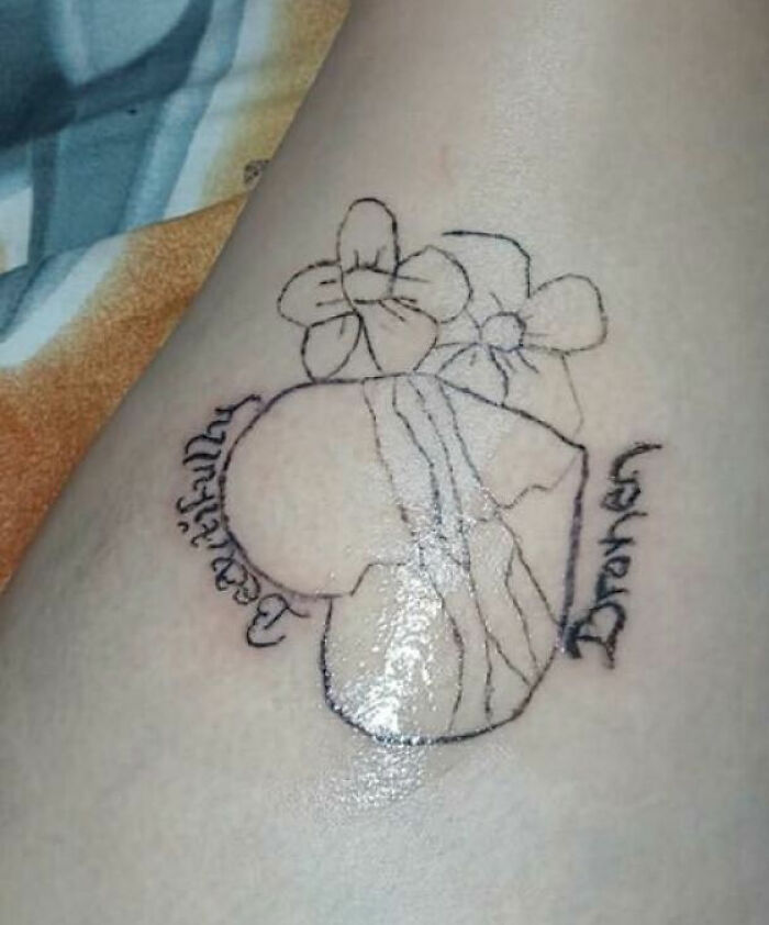 Oops! The Most 'What Were You Thinking?' Tattoos Ever