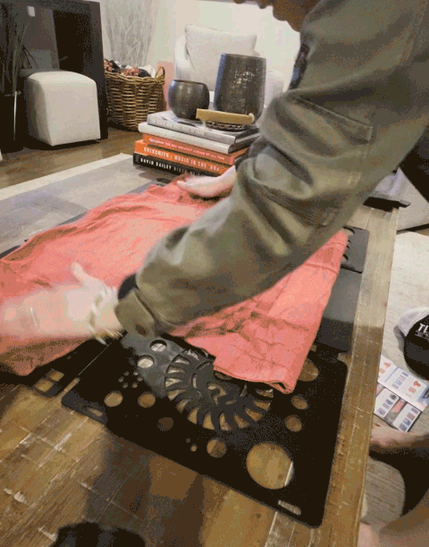 This Shirt Folding Board Makes Folding Less Like Brain Surgery