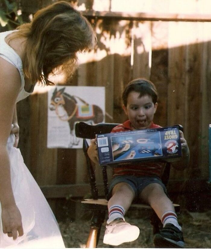 Me at 4, Totally Derping Over a Ghostbusters Toy From Mom, 1989