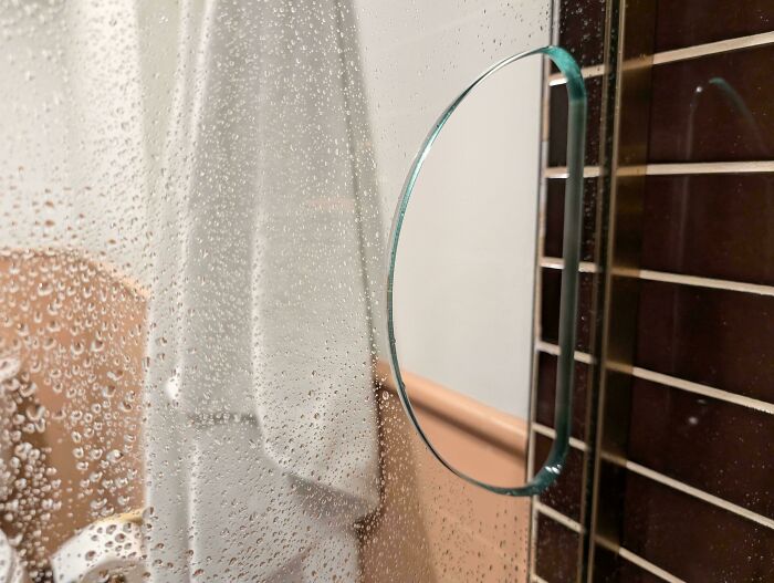 Hotel Shower Glass with a Little Window to Grab Your Towel Without Getting Wet
