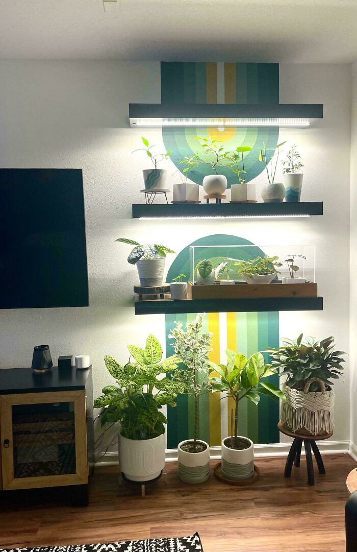 My Husband Built Floating Shelves With Grow Lights, And I Painted A Mural Behind