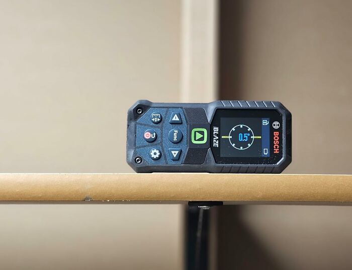 This Green-Beam Laser Distance Measure Makes Measuring Feel Like A Secret Mission