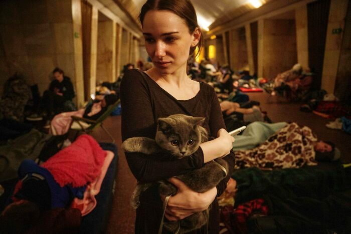 Woman Holding Cat in a Kyiv Metro During an Attack