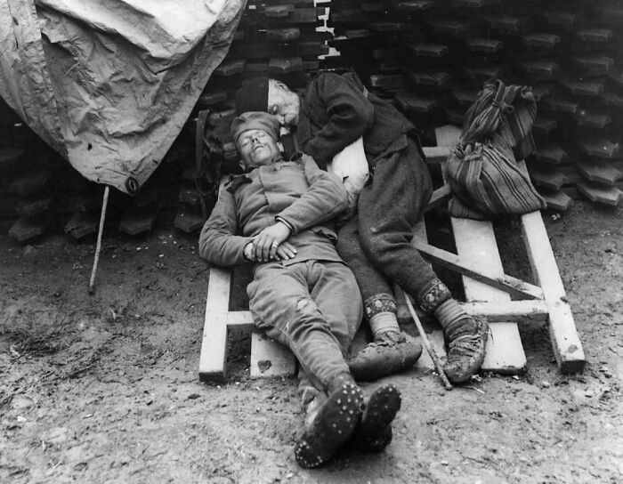 Serbian Soldier Napping with Dad Visiting the Front Line (1914)