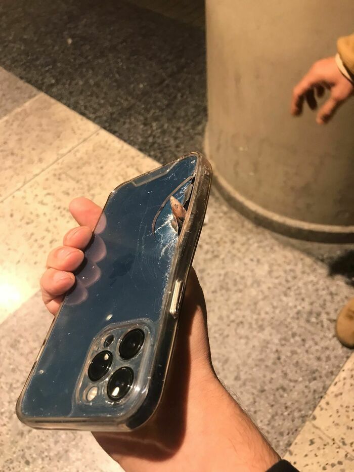 New Year’s Eve Bullet Meets Guy’s Phone—Quite the Firework