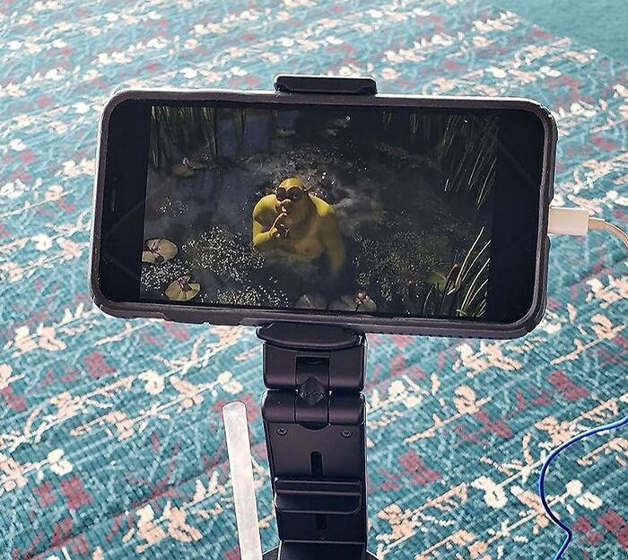 Never Chase Your Phone On A Flight Again Thanks To This Universal Airplane Phone Holder