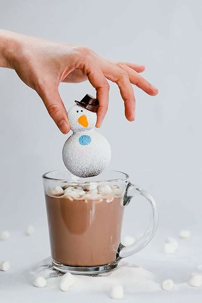 A Chocolate Snowman Cocoa Bomb That Turns Plain Milk Into A Sweet, Marshmallow Surprise