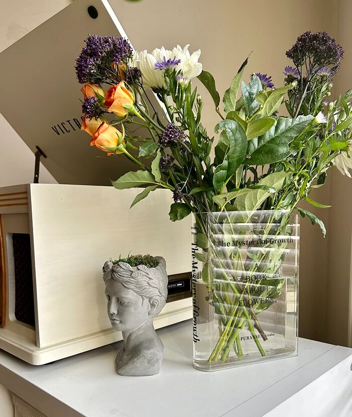 Hold Your Books and Flowers in Style with This Clear Bookend Vase
