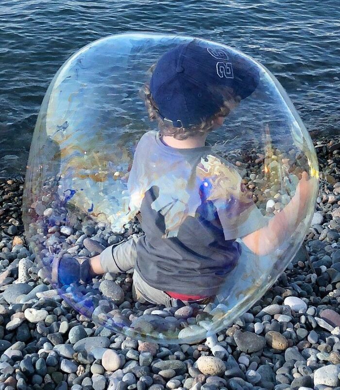 Soap Bubble Magic Between Kid and Camera