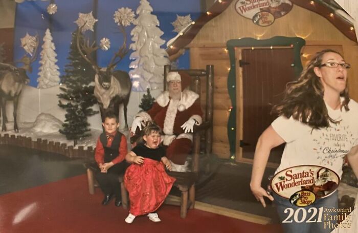 Trying to Get My Kid to Sit for Christmas Pics = Comedy Gold