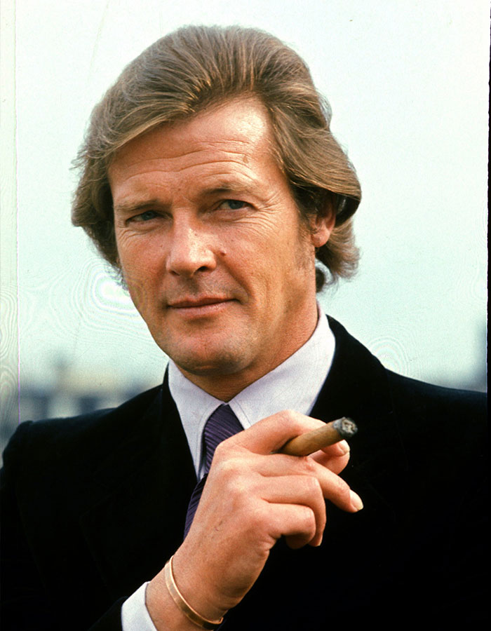 Roger Moore - Unlimited Cigars On Set