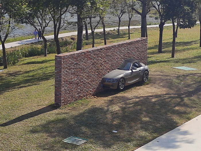 Car Stuck In A Wall... Or Is It?