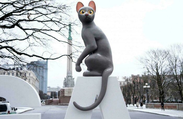 Latvia's First Oscar Win Celebrated With A Cat Statue That Floats in Riga