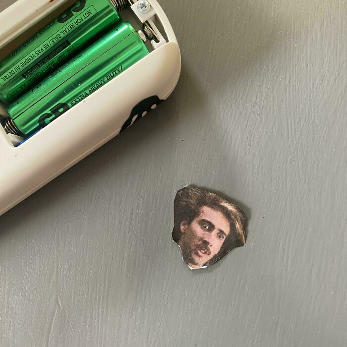 Sister Hid Tiny Nic Cage Pics All Over My House 8 Years Ago, And I Just Found One In The Ceiling Fan Remote