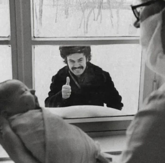 New Dad Giving His Newborn a Thumbs Up (From Outside a Window!), USSR 1977