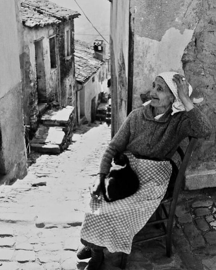 Italian Grandma Taking a Breather in Her Village Alley, 1960s