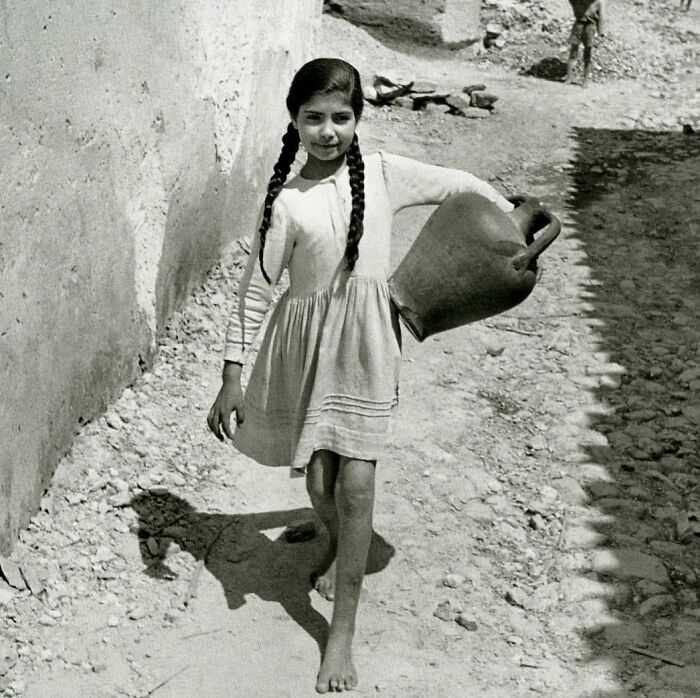 Kiddo Collecting Water in Sardinia, 1954
