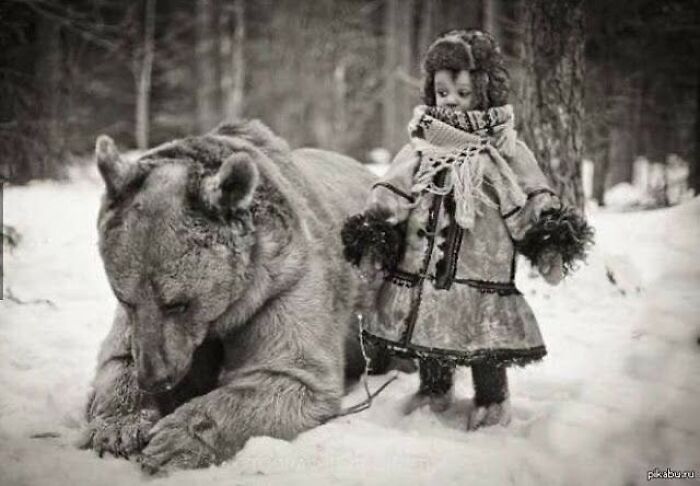 Kid Chilling with a Grizzly Bear, Where? No Idea!