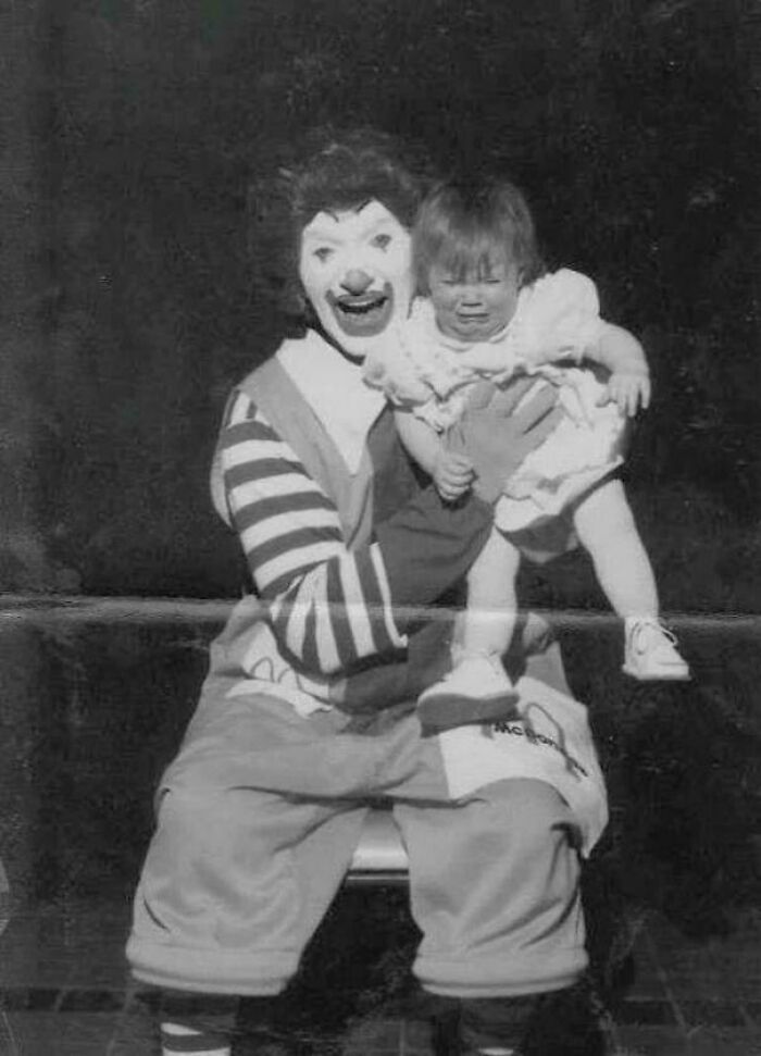 Early Ronald McDonald Acting Up Next To A Crying Baby. Classic!