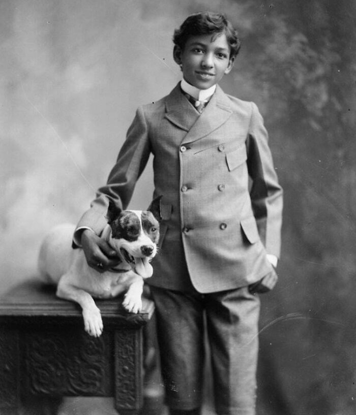 Jamie Winkler Smiles Big with His Fluffy Friend, 1890s