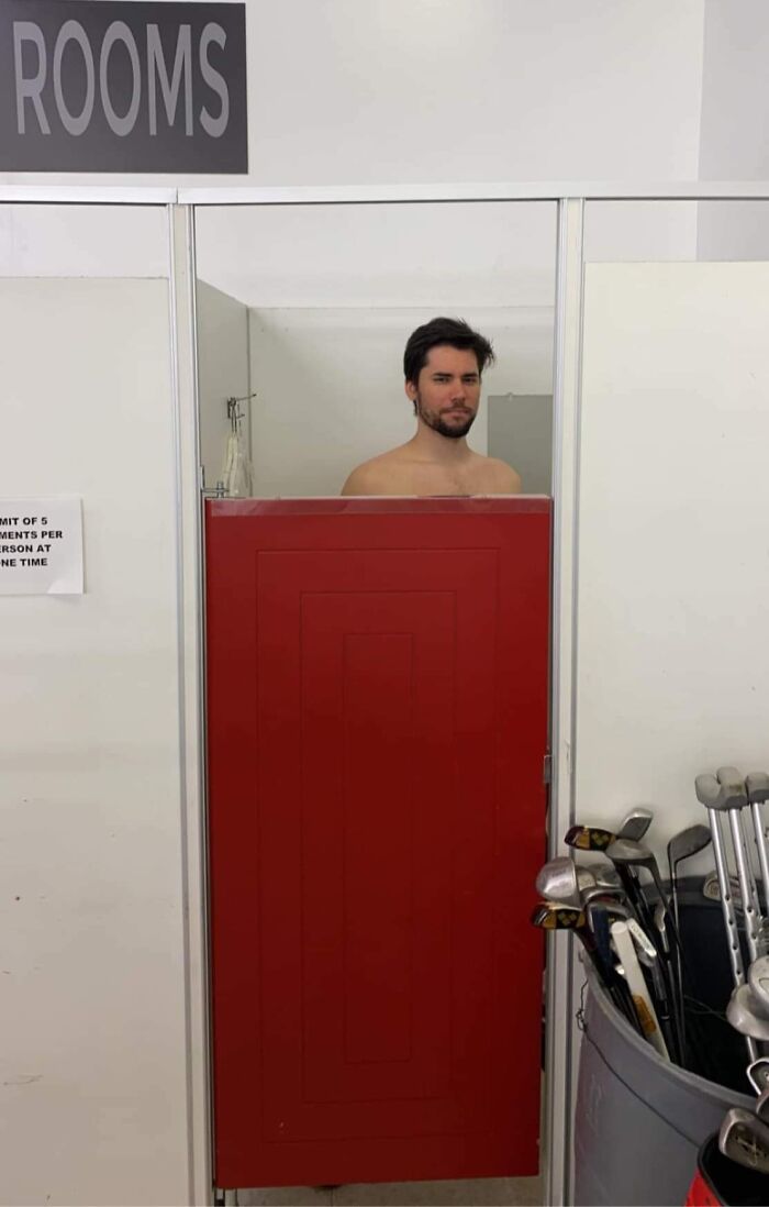When Thrift Store Fitting Room Doors Just Aren’t Built For Giants