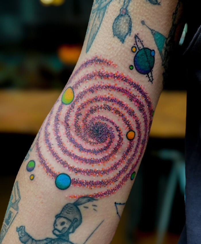 Galaxy Swirls in Tattoo Form