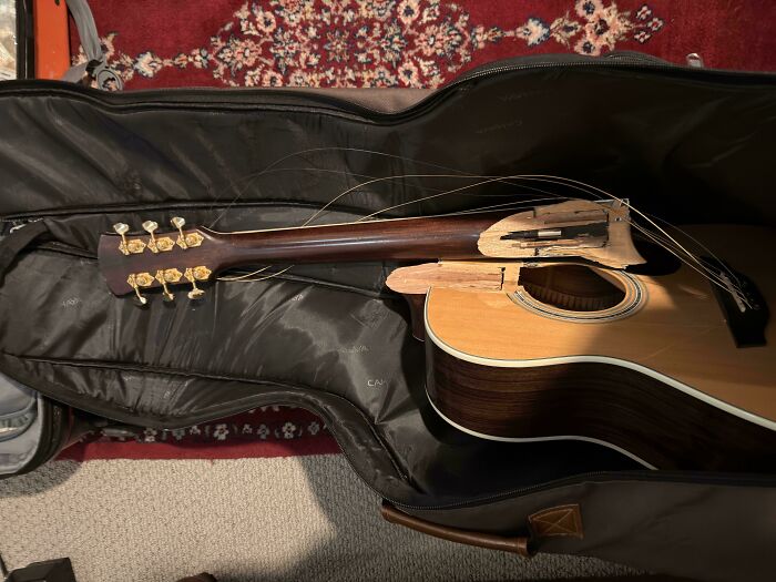 Gate Checked My Guitar, Got It Back In Half Pieces