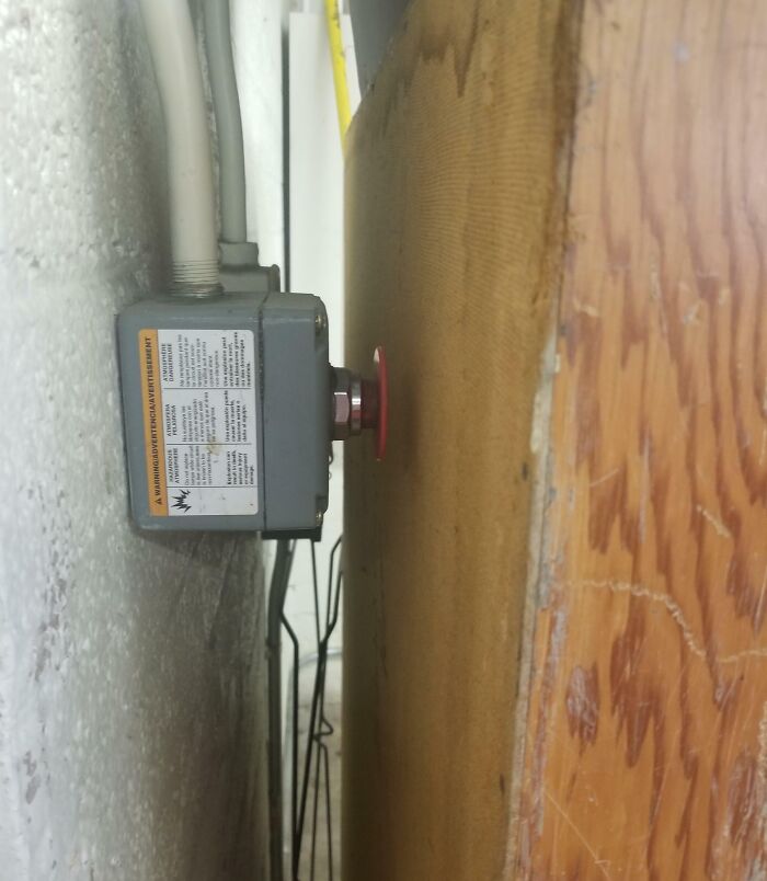 Emergency Power Shut Off...Hidden Behind A Bookshelf?