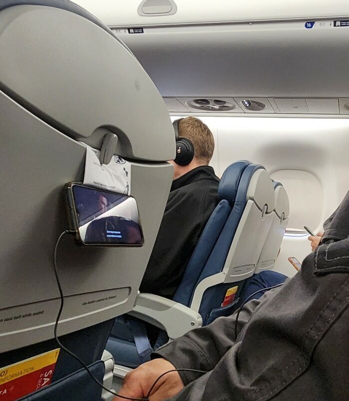 Airplane Boarding Pass Holder Hack. Bold and Brilliant.