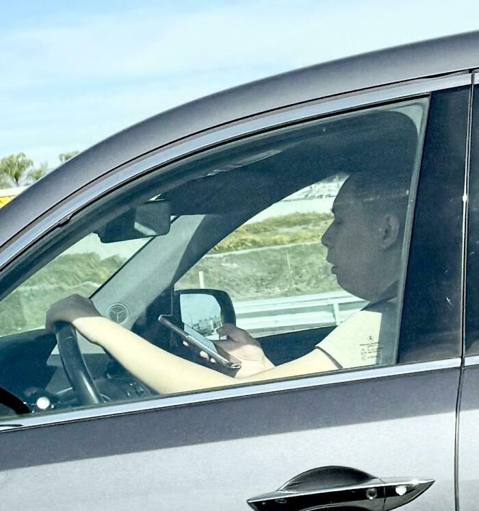 Driving While Playing with Phone? Classic Move!