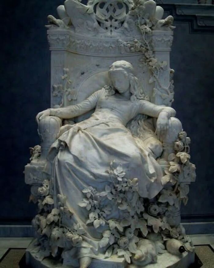 Sleeping Beauty as Marble Art: Surrounded by Roses (and Probably Naps)