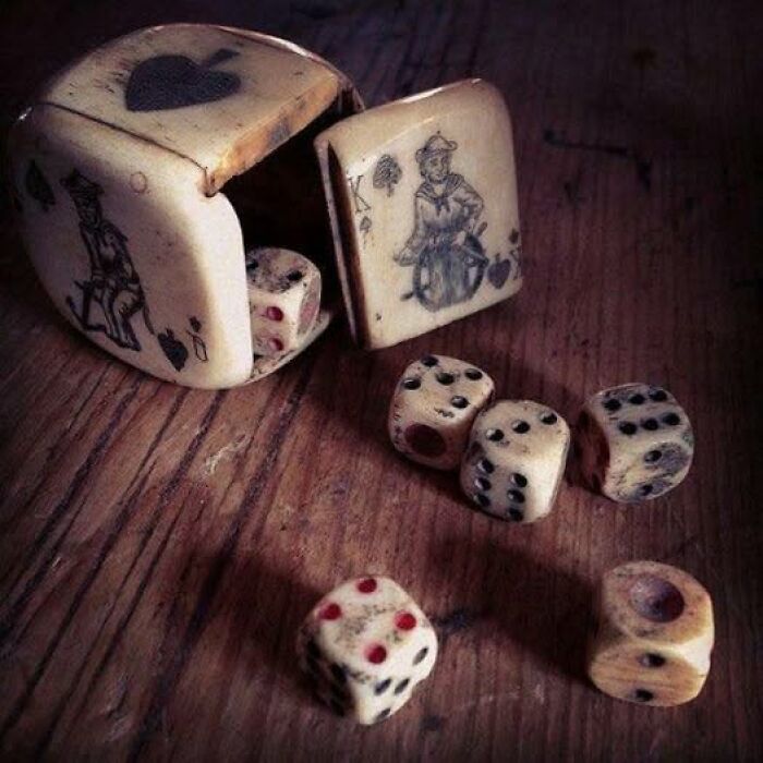 A Sailor’s Masterpiece: Hand-Carved Bone Dice Holder and Dice from the 1880s