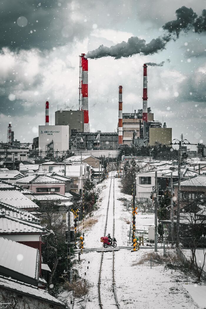 "Microcosm" — Snowy City With One Red Dot