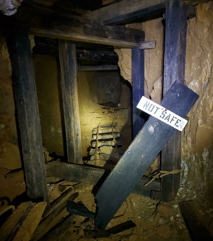 Abandoned Mine Entrance Warning: Floor Drops Into Abyss