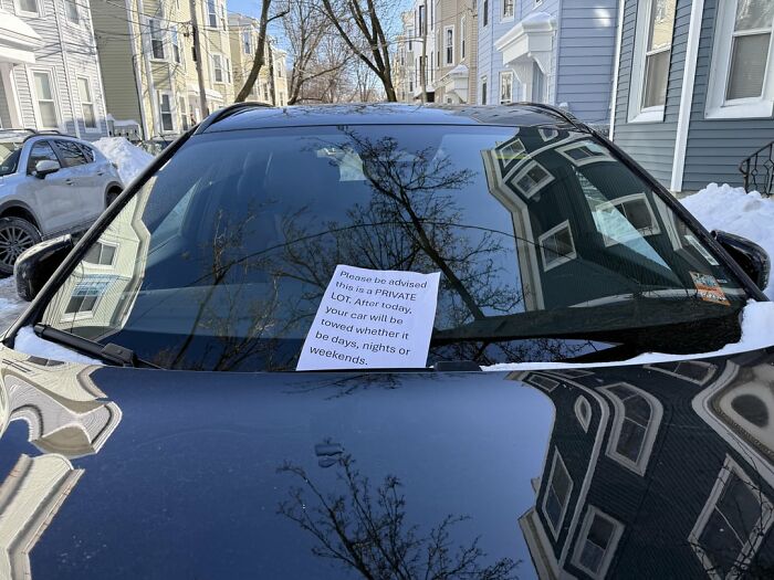 Parking Lot Snow Wars: The Epic Battle for Your Spot!