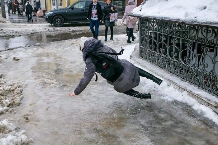 Oops! Slippery Sidewalk Surprise