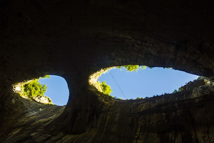 Wait Till You See The Cave With Giant “Eyes” Staring At The Sky!