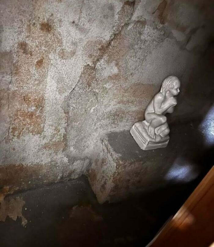 Was Fixing Internet on Top Floor, Found This Behind the Wall—Surprisingly Catholic!