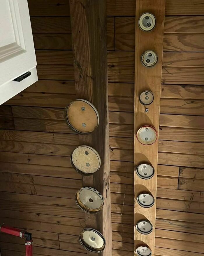 Why Are There Jar Lids Screwed To The Basement Ceiling?