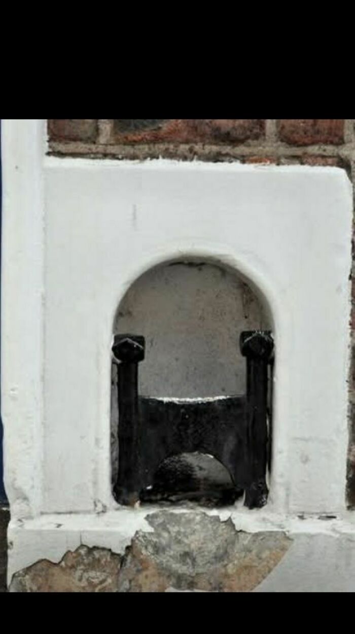 What's That Thing Built Into The Side Of An Old Brick House?