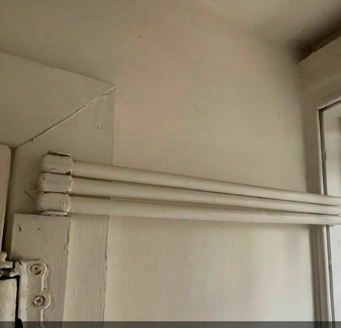 What's With Those Wooden Poles On The Rear Door Hinge?