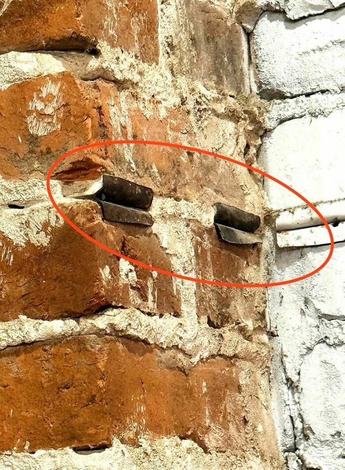 Metal Things Embedded In Bricks? Whistles!