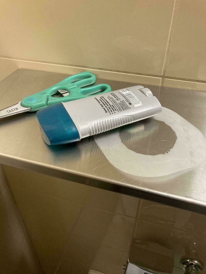 What Are These Plastic Things Doing In A Men’s Bathroom Stall?