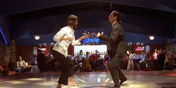 Vincent Vega in Pulp Fiction escorts his boss’s wife on a shaky date that everyone warns him about — spoiler, chaos ensues.