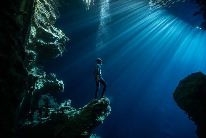 Freediver Meets Magical Cave Light